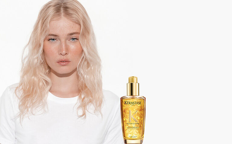 Kerastase Elixir Ultime model with nourishing hair care products