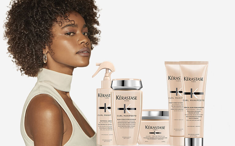 Kerastase Curl Manifesto model with products for curly and coily hair.