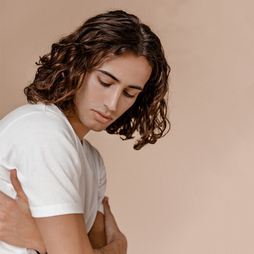 male model with thick long hair