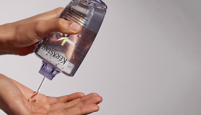 Blond Absolu Lumiere Shampoo squeezed into hand