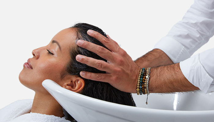 Blond Absolu Lumiere Shampoo squeezed into hand